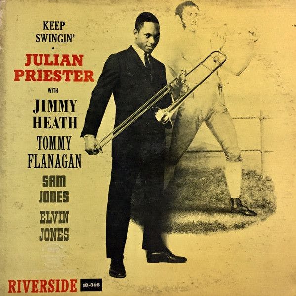 A vintage album cover of a man in a tux holding a trombone with the shadow of a boxer behind him